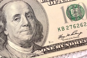 Dollars closeup. Benjamin Franklin portrait on one hundred dollar bill