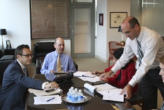 Hirshfeld (standing right) has been a member of USPTO senior management since 2009.