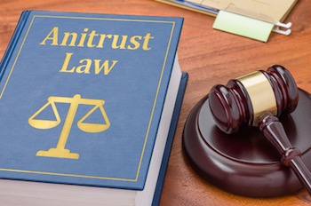 Antitrust law book and gavel