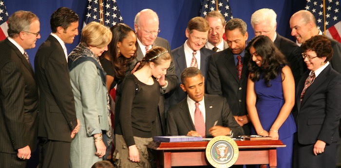 President Obama signs the America Invents Act into Law, September 16, 2011.