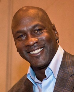 "Michael Jordan at NBA's Board of Governors Meeting, April 17, 2014" by D. Myles Cullen/DOD. Public domain.