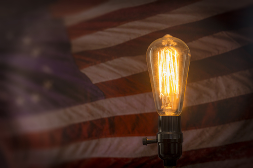outsiders, inventors - https://depositphotos.com/104773774/stock-photo-edison-lightbulb-american-flag.html