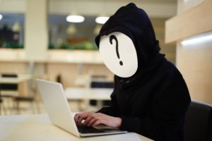 https://depositphotos.com/141346076/stock-photo-anonymous-hacker-at-work.html