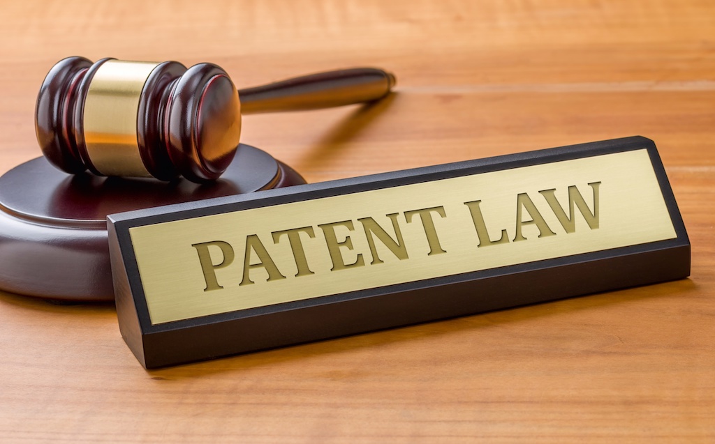 patent filings - https://depositphotos.com/253404762/stock-photo-a-gavel-and-a-name.html