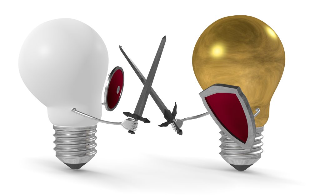 https://depositphotos.com/40634949/stock-photo-golden-light-bulb-fighting-duel.html