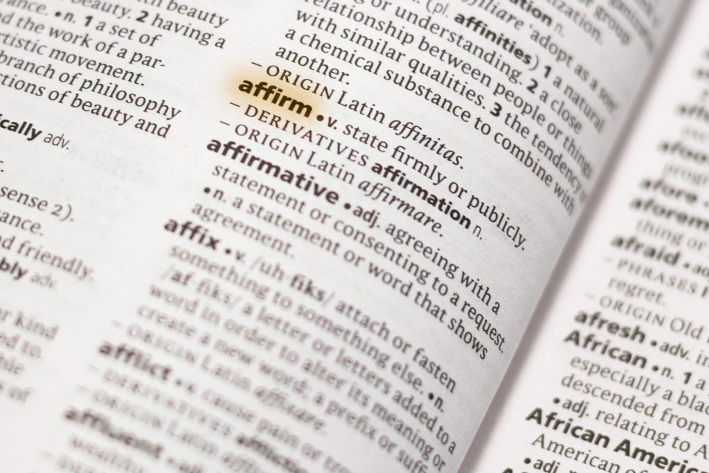 ANDA - https://depositphotos.com/229492118/stock-photo-word-phrase-affirm-dictionary-highlighted.html