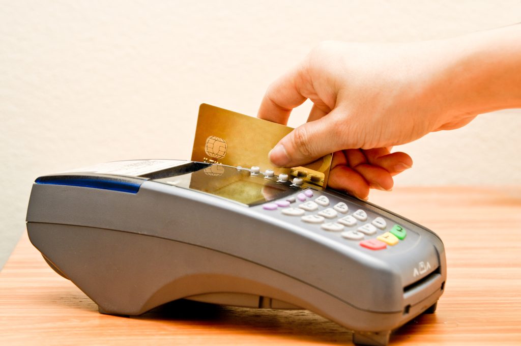 claim construction - https://depositphotos.com/59930373/stock-photo-payment-machine-and-credit-card.html