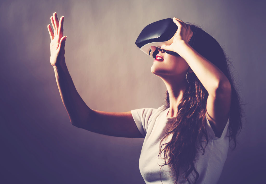 https://depositphotos.com/126089794/stock-photo-woman-using-virtual-reality-headset.html
